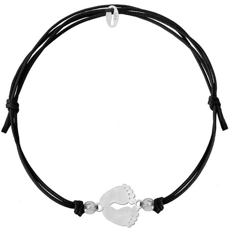 A black string bracelet with a silver foot pendant
